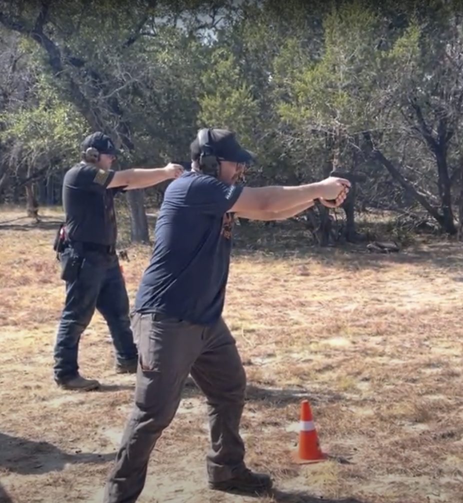 Paris Vega shooting his Glock 45 Gen 5 pistol during a dueling tree target competition